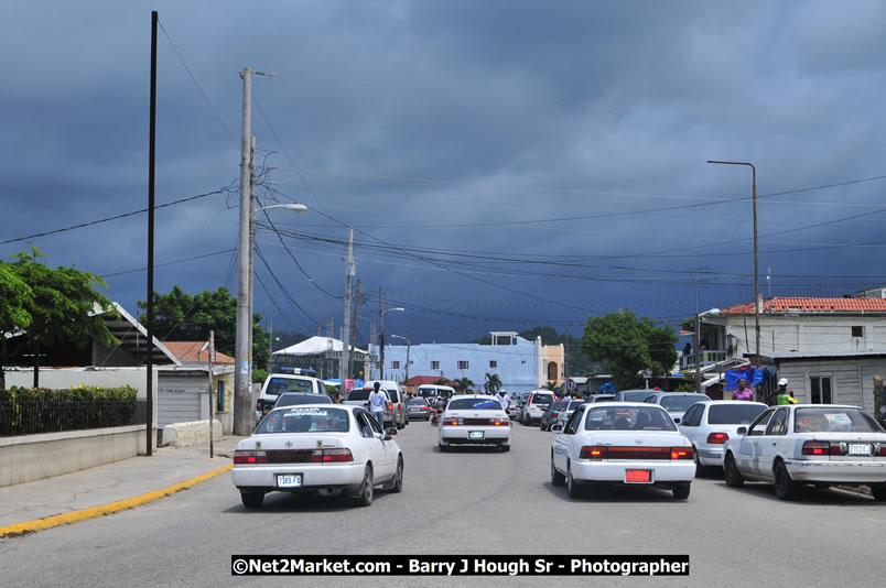 Lucea Cross the Harbour @ Lucea Car Park - All Day Event - Cross the Harbour Swim, Boat Rides, and Entertainment for the Family - Concert Featuring: Bushman, George Nooksl, Little Hero, Bushi One String, Dog Rice and many local Artists - Friday, August 1, 2008 - Lucea, Hanover Jamaica - Photographs by Net2Market.com - Barry J. Hough Sr. Photojournalist/Photograper - Photographs taken with a Nikon D300 - Negril Travel Guide, Negril Jamaica WI - http://www.negriltravelguide.com - info@negriltravelguide.com...!