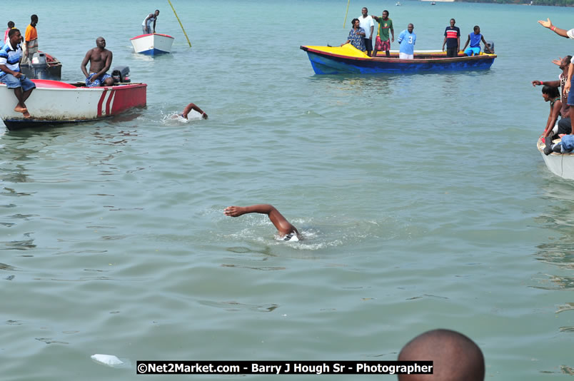 Lucea Cross the Harbour @ Lucea Car Park - All Day Event - Cross the Harbour Swim, Boat Rides, and Entertainment for the Family - Concert Featuring: Bushman, George Nooksl, Little Hero, Bushi One String, Dog Rice and many local Artists - Friday, August 1, 2008 - Lucea, Hanover Jamaica - Photographs by Net2Market.com - Barry J. Hough Sr. Photojournalist/Photograper - Photographs taken with a Nikon D300 - Negril Travel Guide, Negril Jamaica WI - http://www.negriltravelguide.com - info@negriltravelguide.com...!