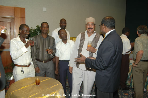 Red Cap Porters Awards - Minister of Tourism, Hon. Edmund Bartlett - Director of Tourism, Basil Smith - Friday, December 14, 2007 - Holiday Inn Sunspree, Montego Bay, Jamaica W.I. - Photographs by Net2Market.com - Barry J. Hough Sr, Photographer - Negril Travel Guide, Negril Jamaica WI - http://www.negriltravelguide.com - info@negriltravelguide.com...!