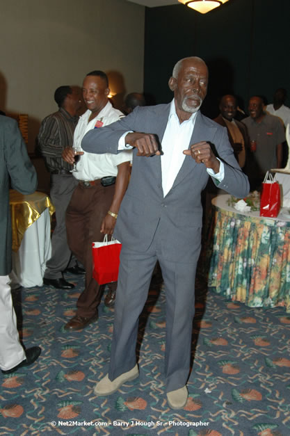 Red Cap Porters Awards - Minister of Tourism, Hon. Edmund Bartlett - Director of Tourism, Basil Smith - Friday, December 14, 2007 - Holiday Inn Sunspree, Montego Bay, Jamaica W.I. - Photographs by Net2Market.com - Barry J. Hough Sr, Photographer - Negril Travel Guide, Negril Jamaica WI - http://www.negriltravelguide.com - info@negriltravelguide.com...!