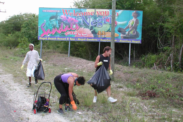 Volunteers Clean-Up Roadside Entrance to Negril - Negril Travel Guide